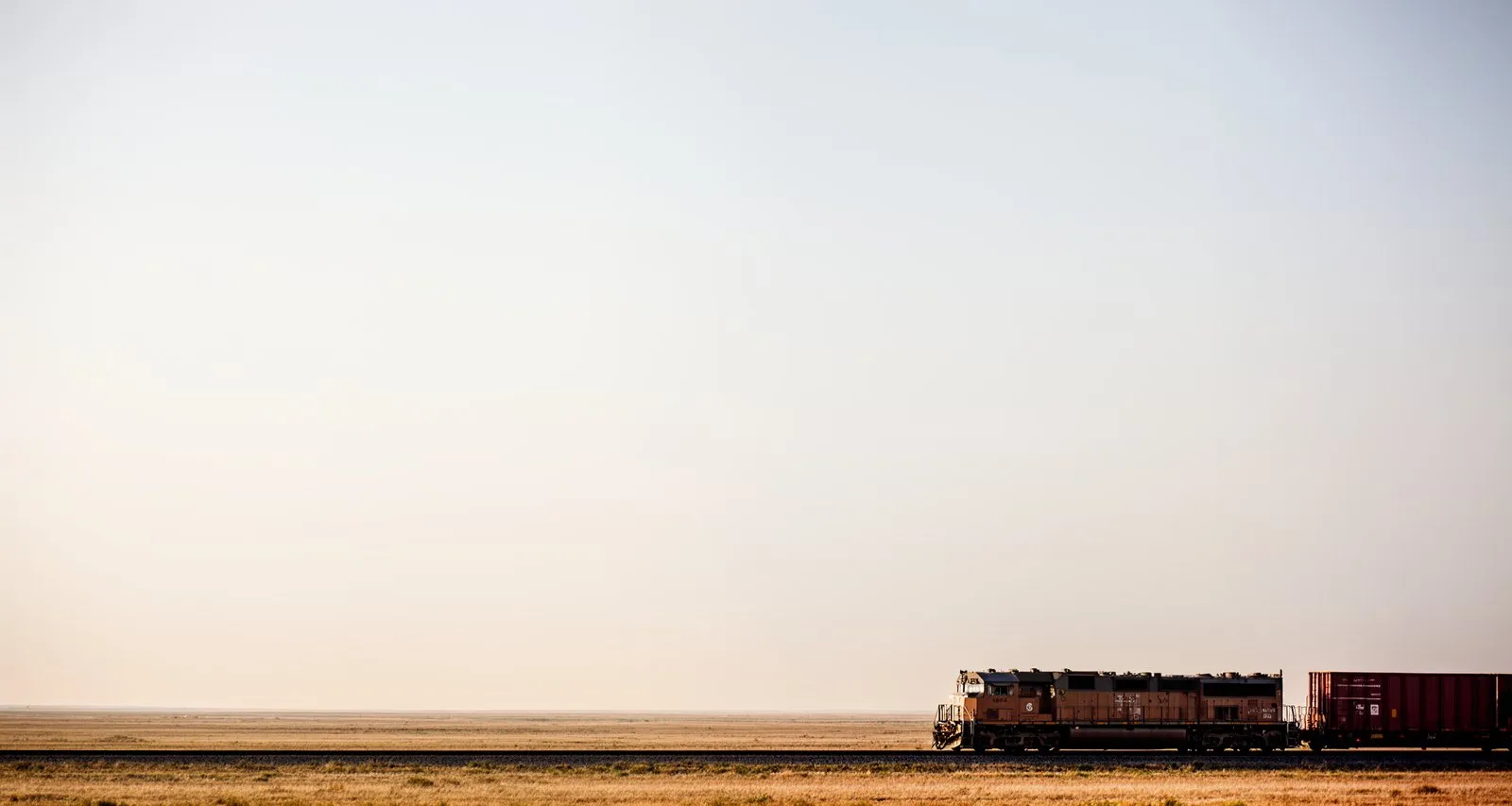 Freight train crossing the plains
